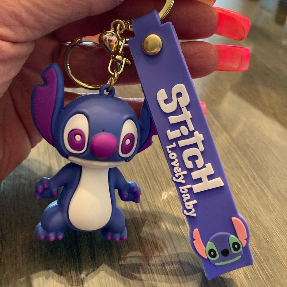Stitch purple Keychain/Hang on Book bag/Hang from your pock nwt